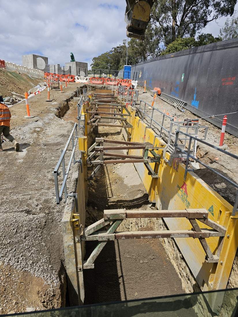Shored trench with engineered access